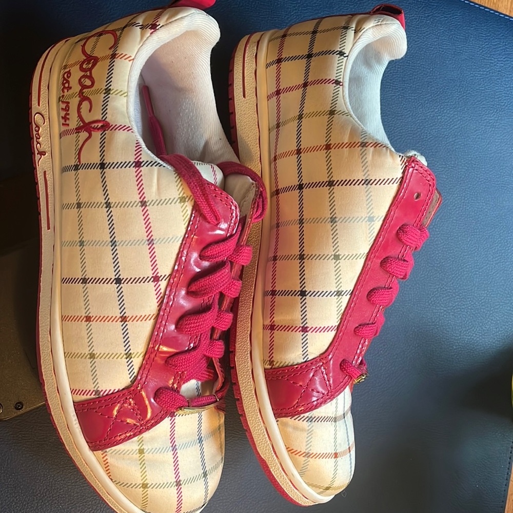Coach plaid women’s sneaker size 8.5 with fuchsia ties.